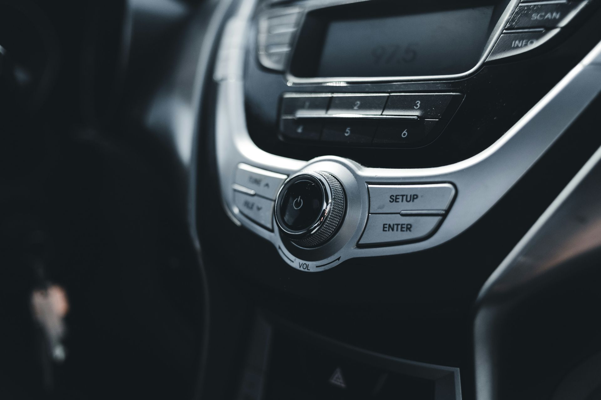 a close up of a car radio with a camera
